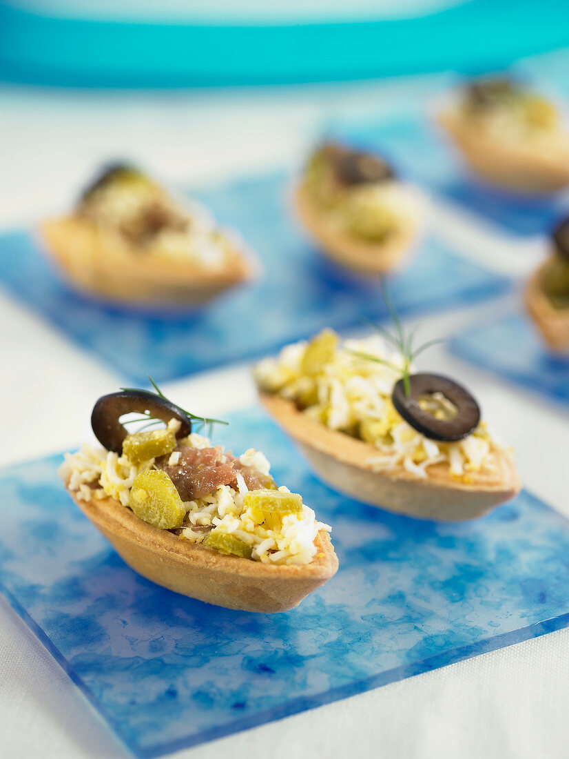 Anchocy, black pepper, egg and gherkin canapés