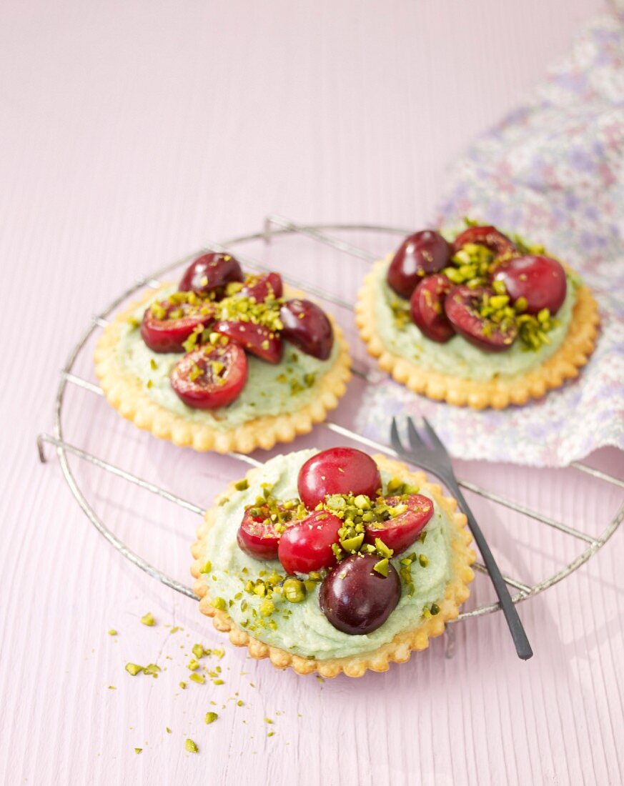 Pistachio cream and cherry tarlets