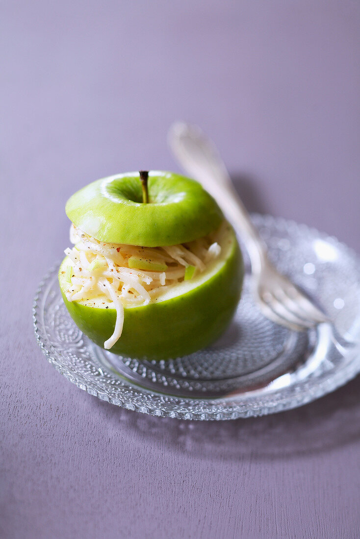 Grated celeriac and apple served in a Granny Smith apple