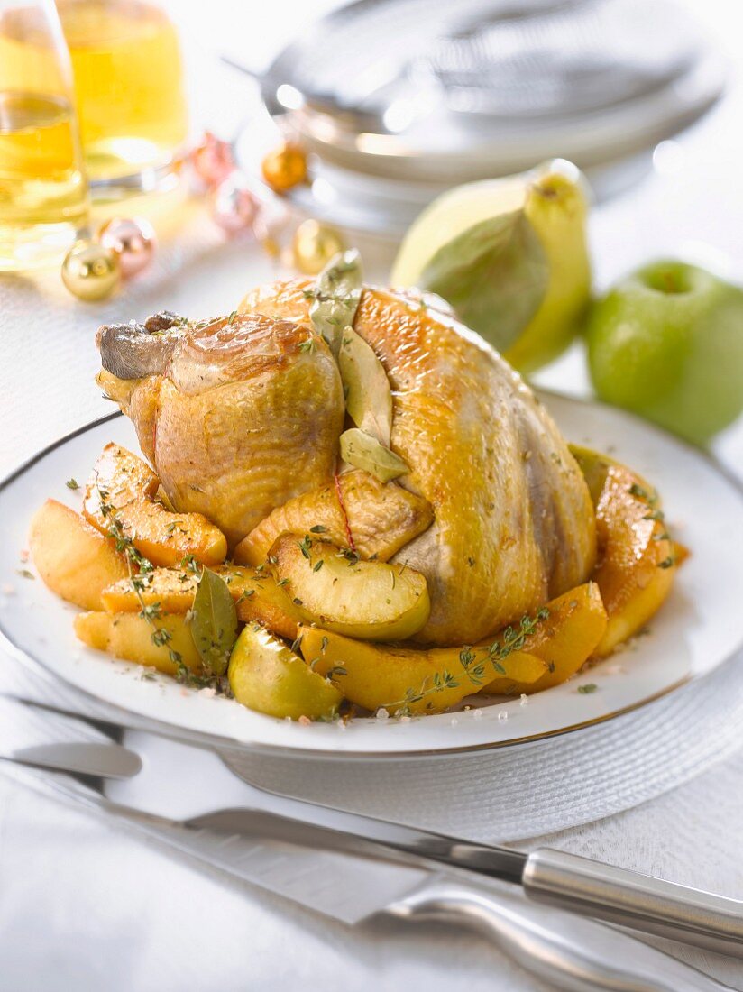 Stuffed capon with quince,apples and herbs