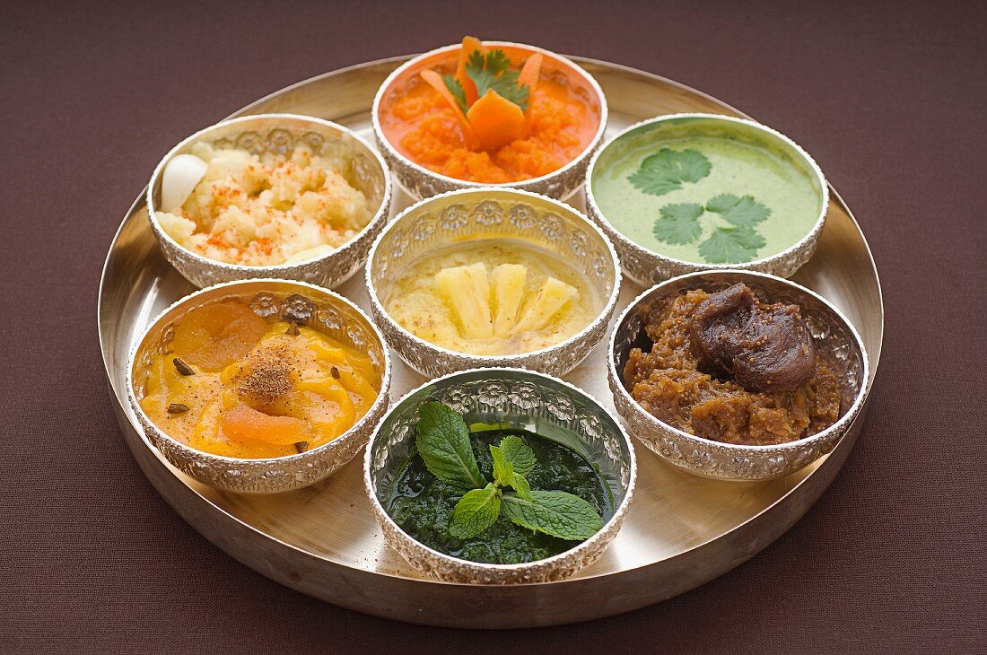 Tray of seven Indian chutneys