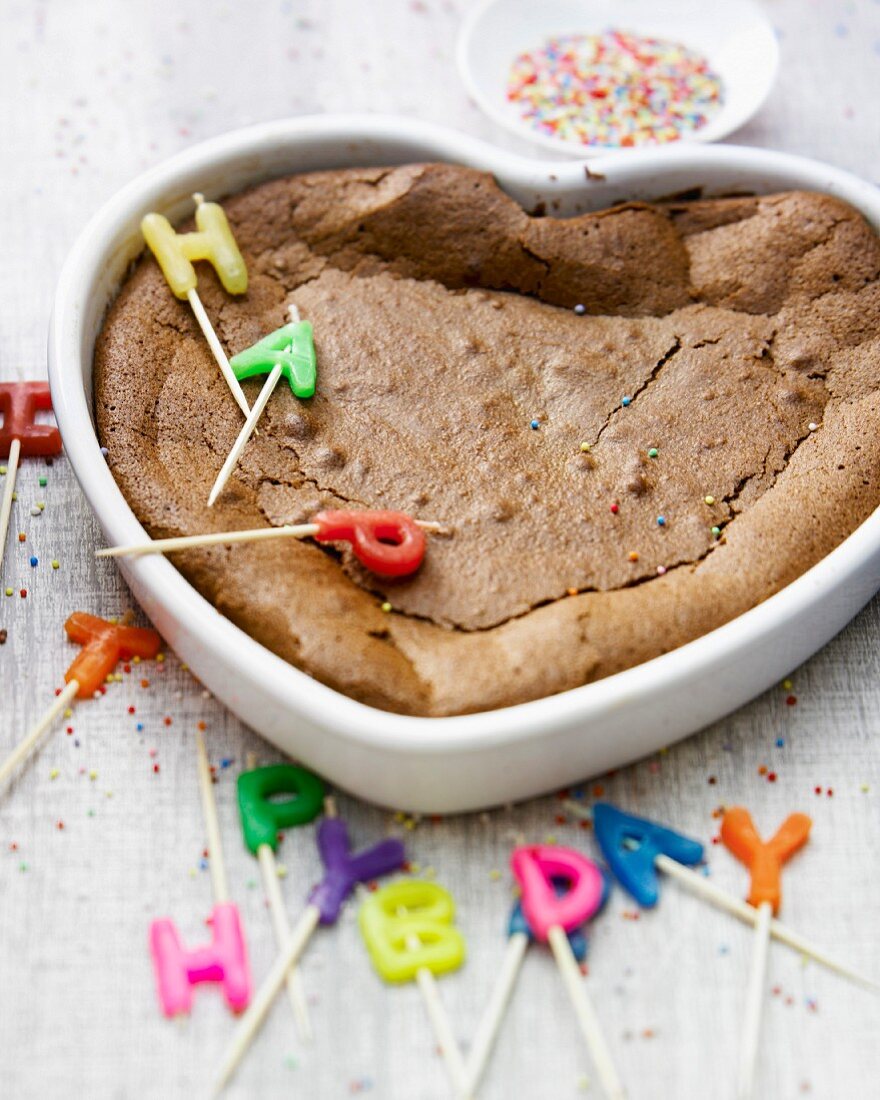 Heart-shaped chocolate birthday cake