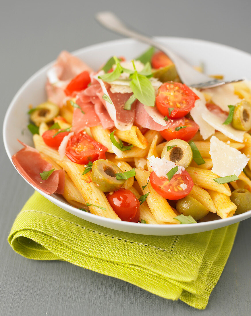 Penne with olives,cherry tomatoes,raw ham and parmesan