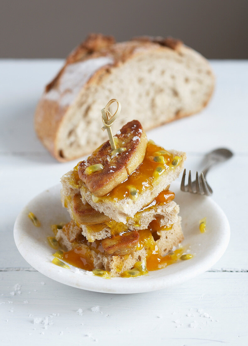 Layered bread,pan-fried foie gras and passionfruit appetizers