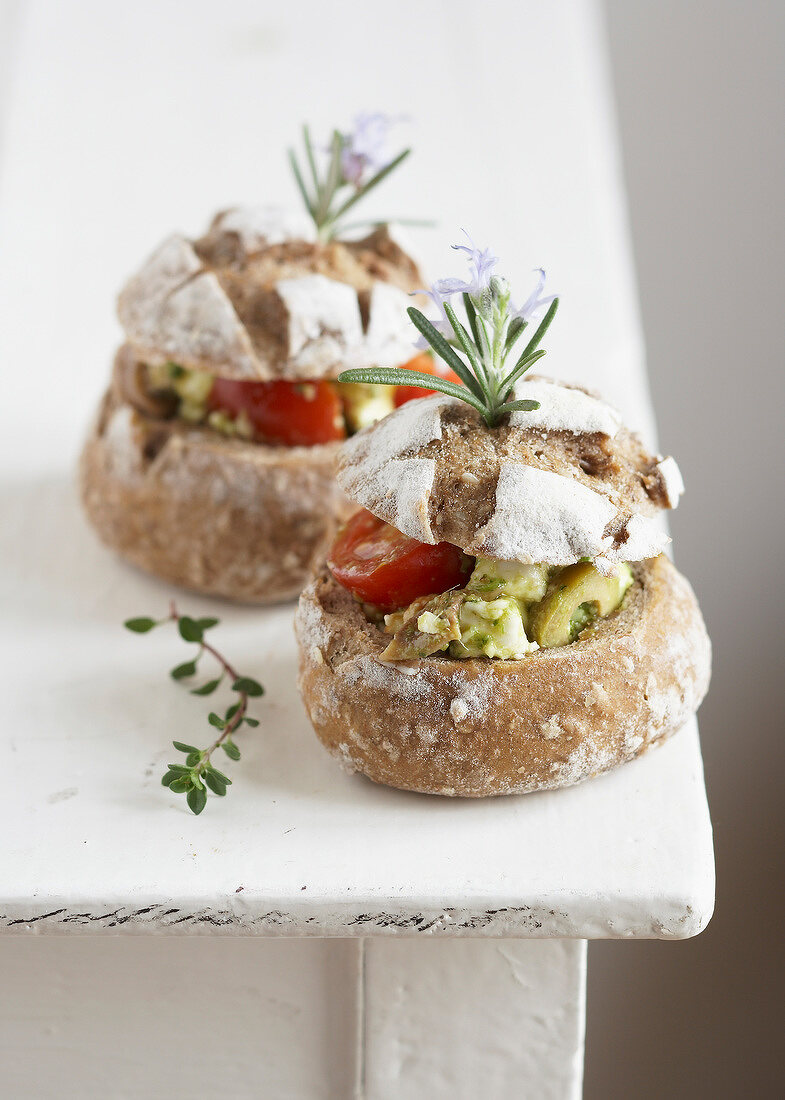 Feta, pesto, olive and tomato bread buns