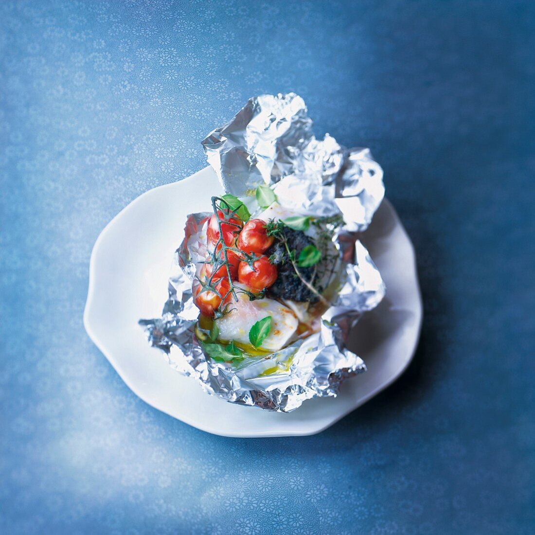 Cod cooked in aluminium foil
