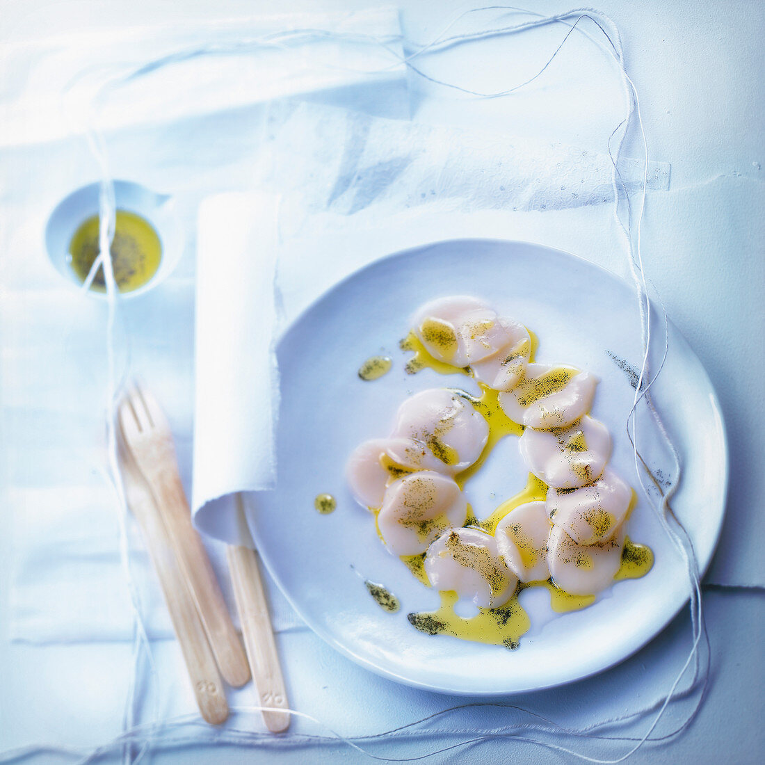 Jakobsmuschel-Carpaccio mit Vanille-Vinaigrette