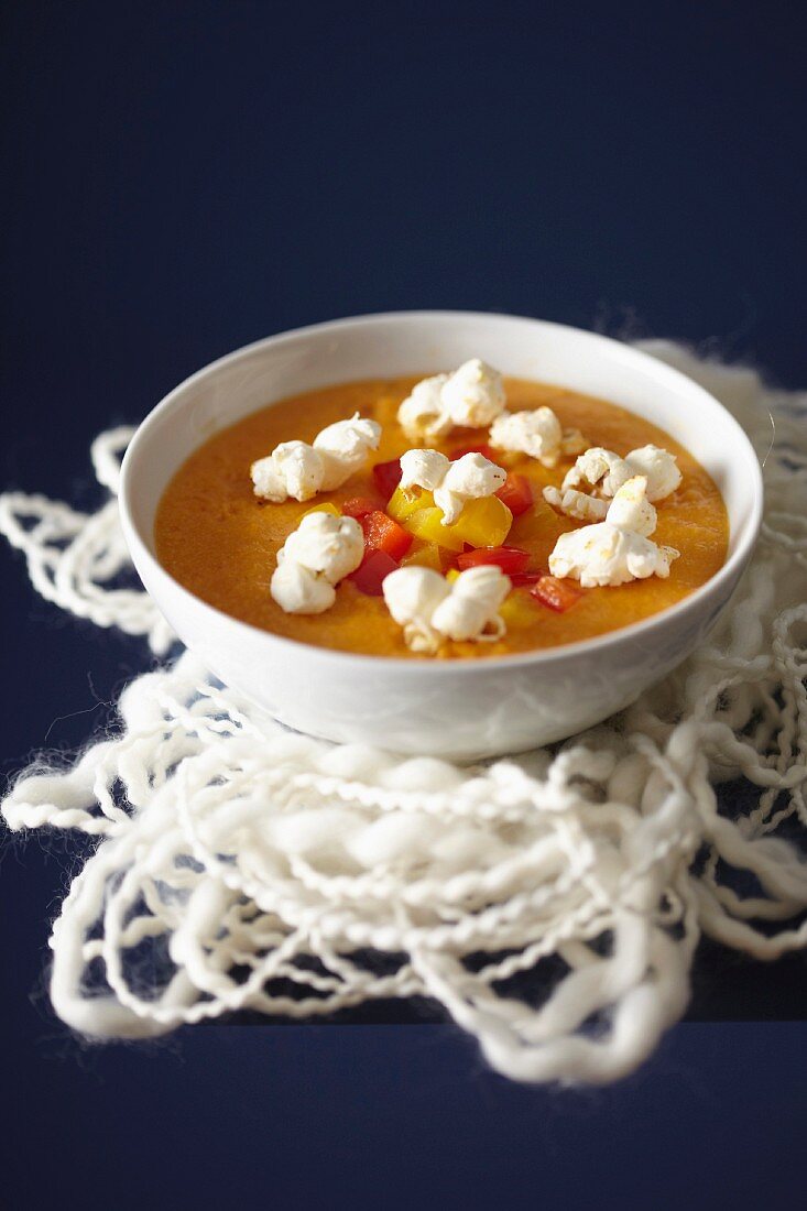 Sweet corn and pepper soup with pop corn
