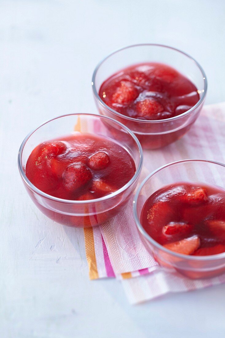 Strawberries in hibiscus jelly