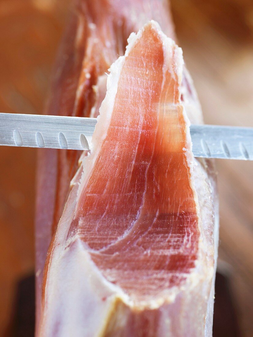 Carving a Serrano ham