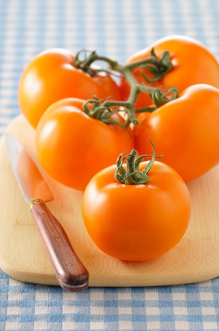 Bunch of orange tomatoes