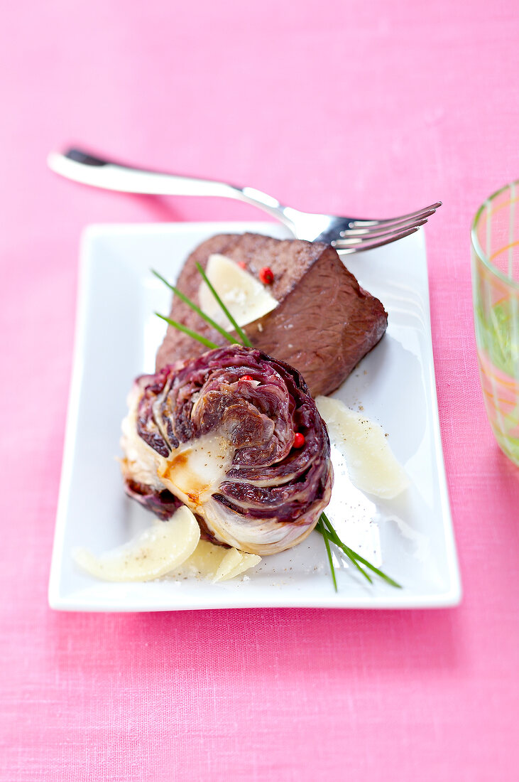 Piece of beef with braised chicory of Trévise