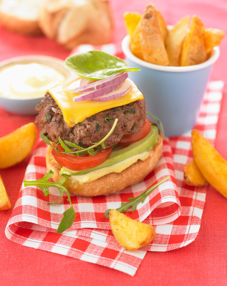 Hamburger with avocado and cheese,potatoes