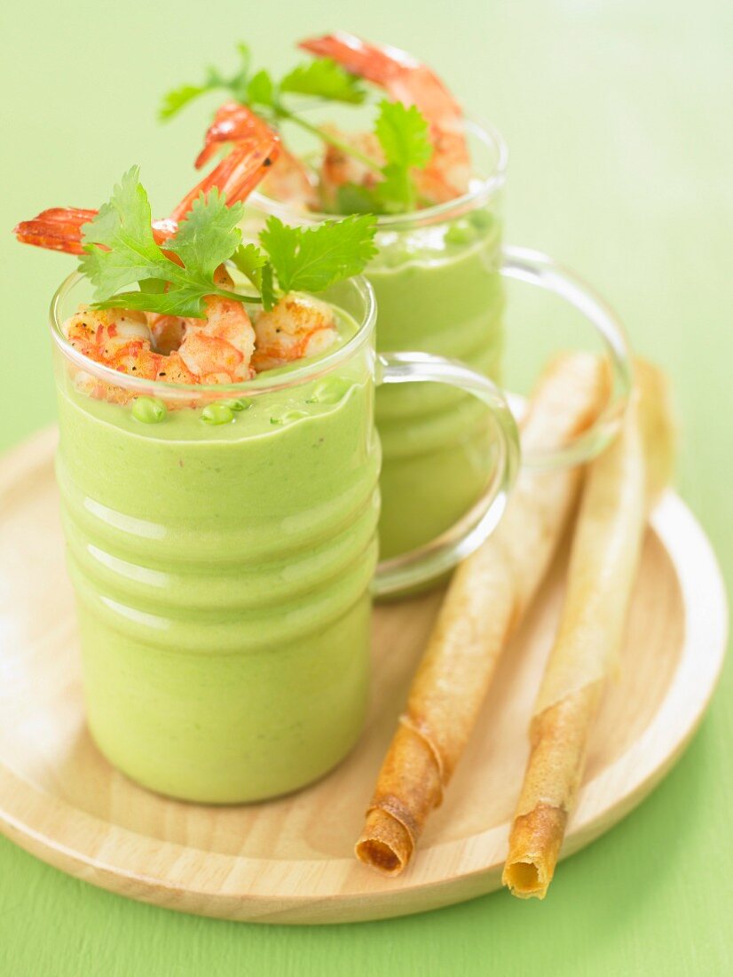 Cream of pea soup with shrimps