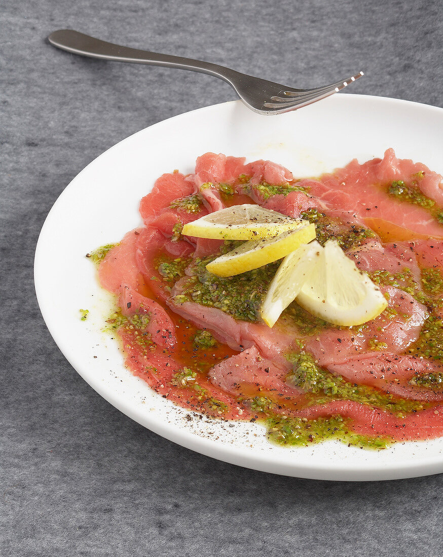 Walnut carpaccio with crushed pistachios
