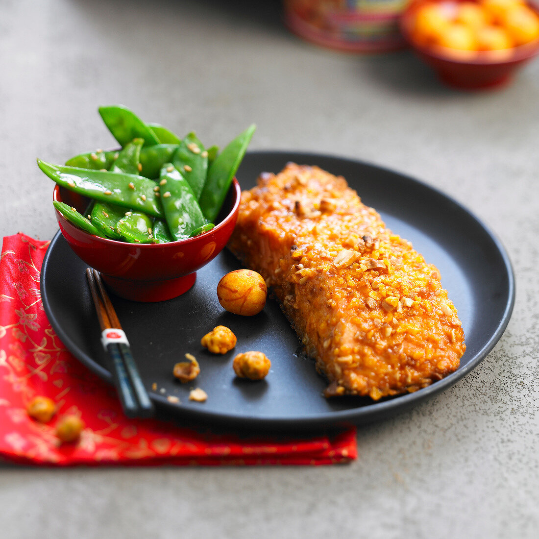 Salmon coated with crushed Japonese aperitif bites