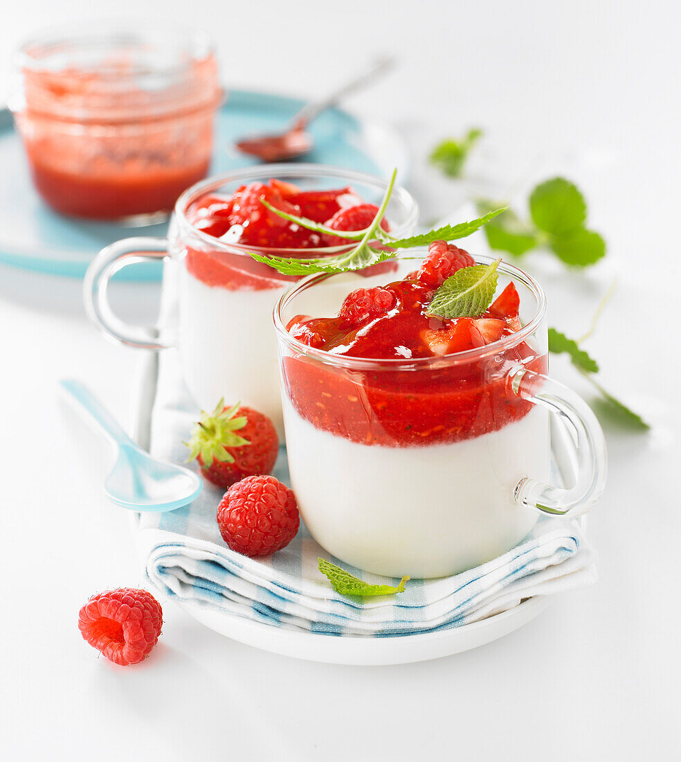 Panna cotta with pureed raspberries and strawberries
