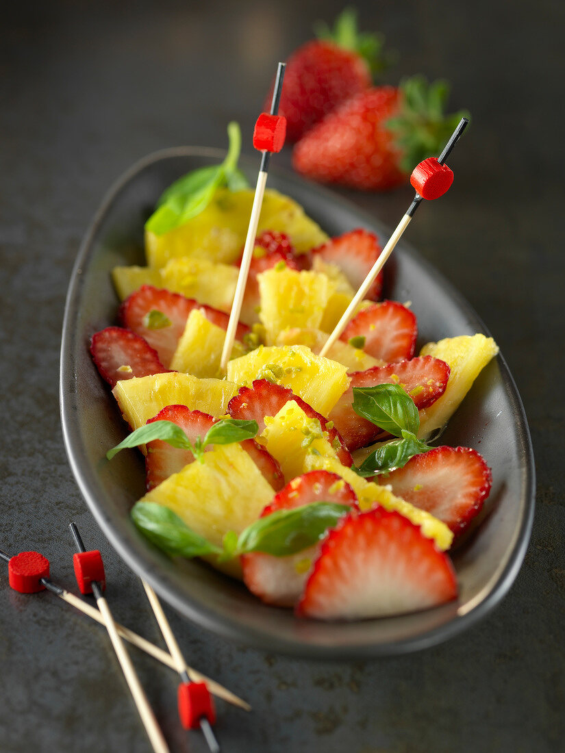 Strawberry and pineapple carpaccio with basil