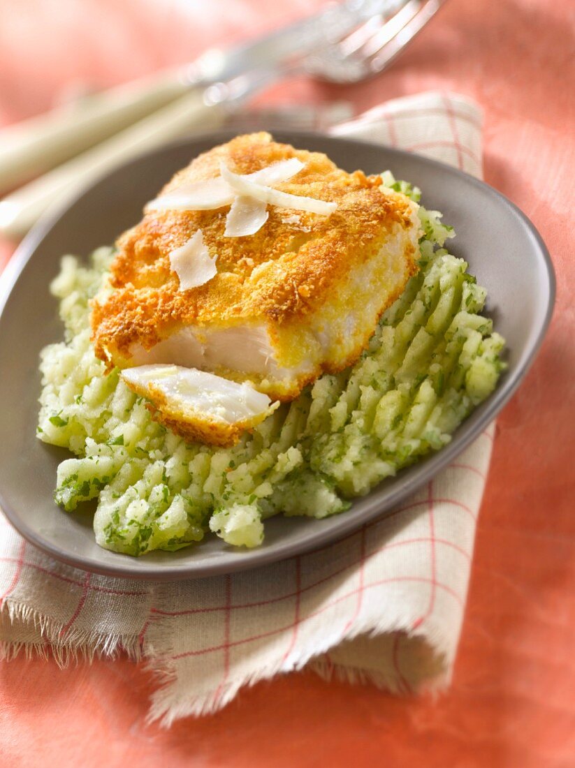 Thick piece of cod in parmesan crust, potato and parsley mash