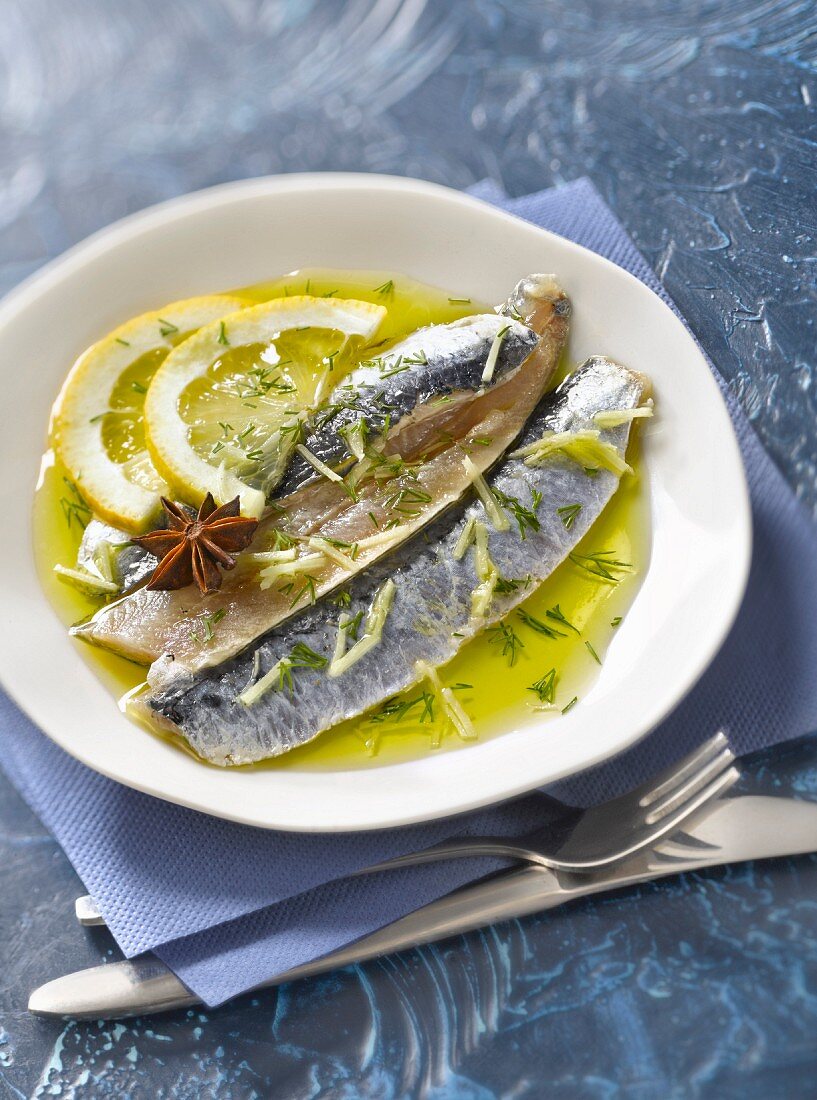 Raw sardine fillets marinated in olive oil,lemon,ginger and star anise