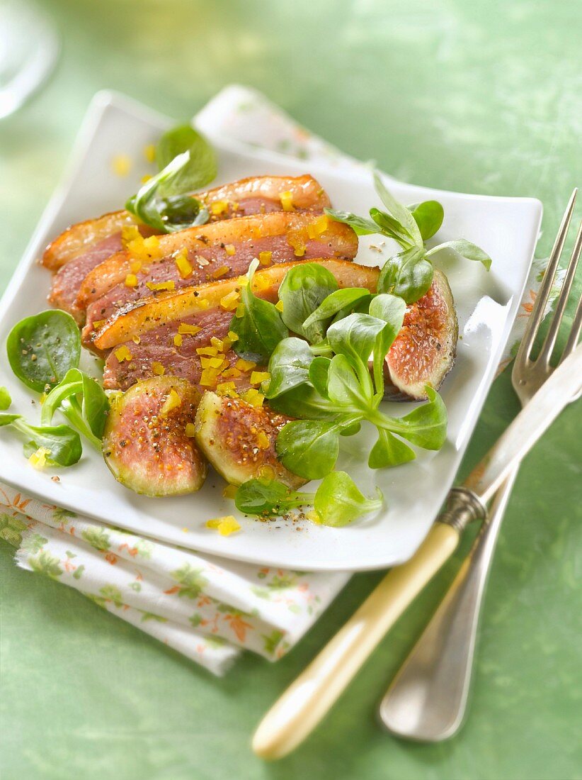 Roast duck breast with figs and corn lettuce