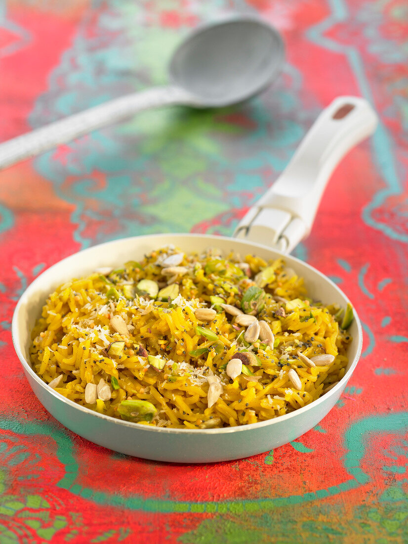 Sauteed rice with seeds and dried fruit