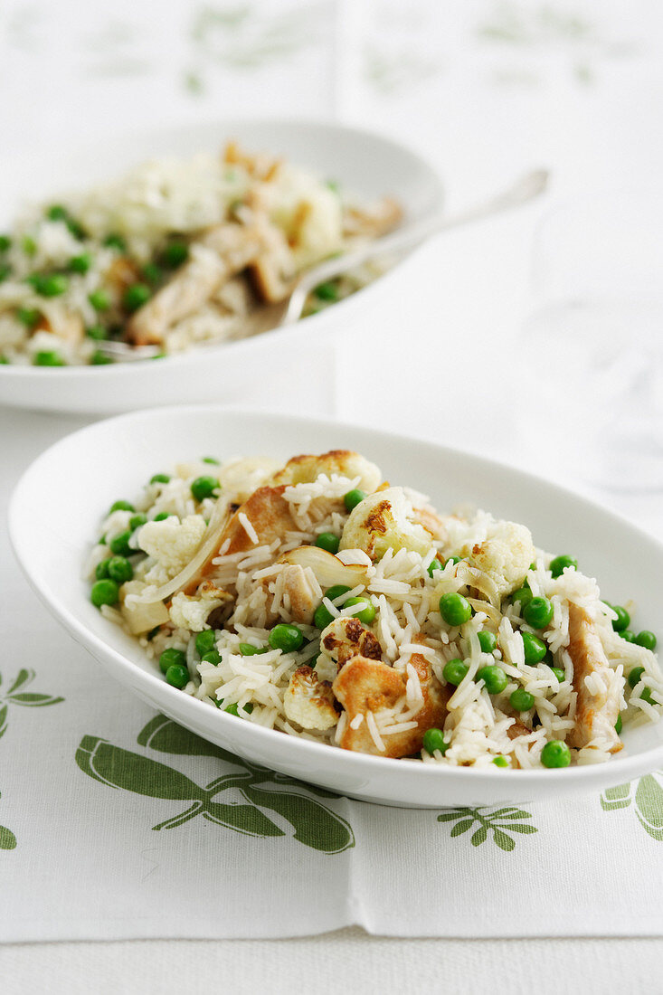 Indian chicken with rice and peas