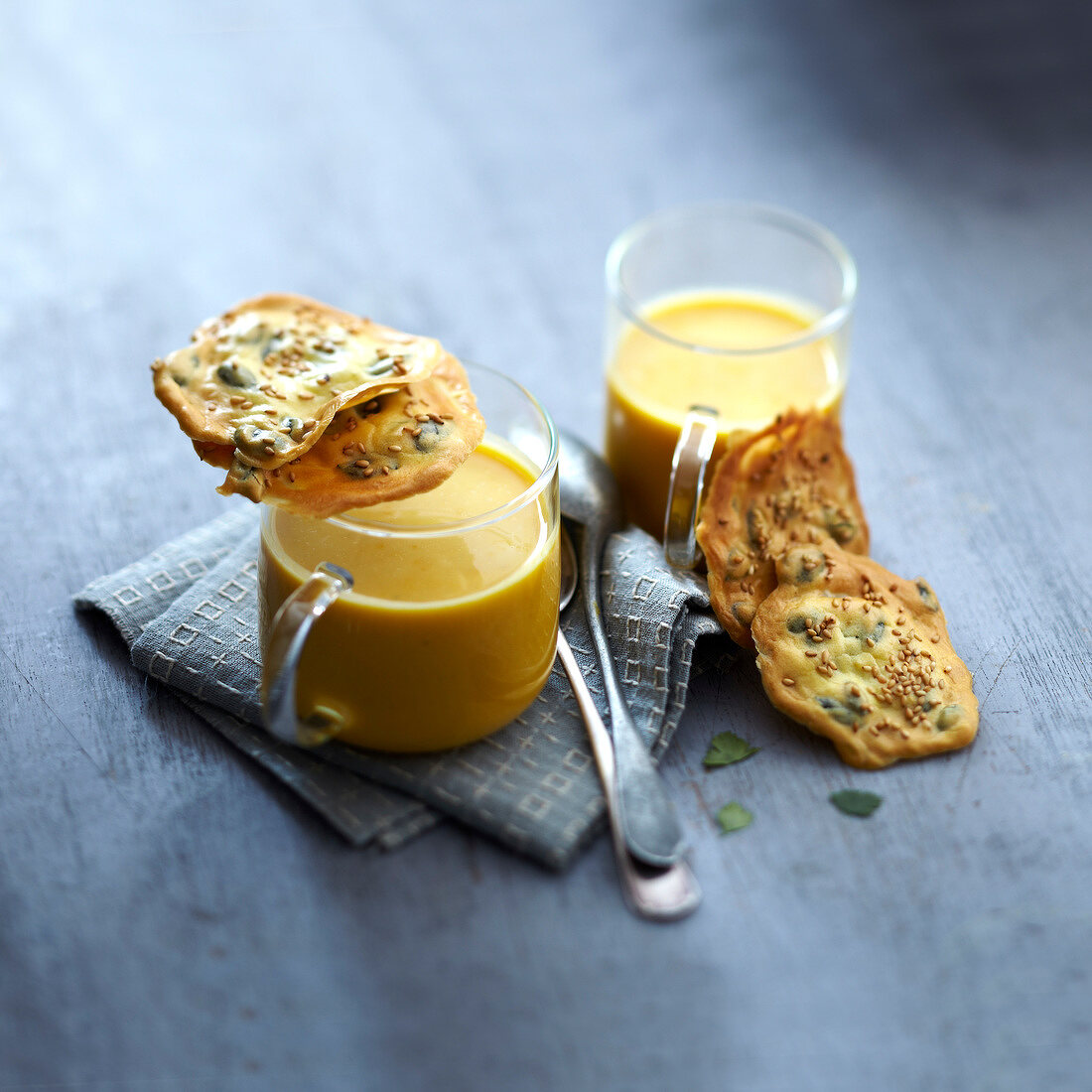 Cream of pumpkin and orange lentil soup,squash seed crisps