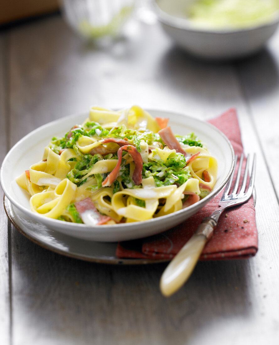 Tagliatelles with Parma ham and cabbages