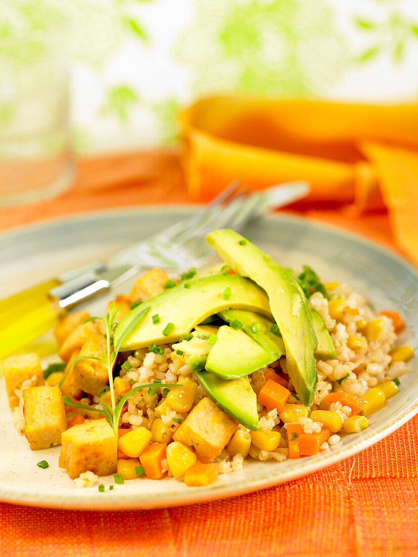 Rice,avocado,sweet corn,tofu and carrot salad