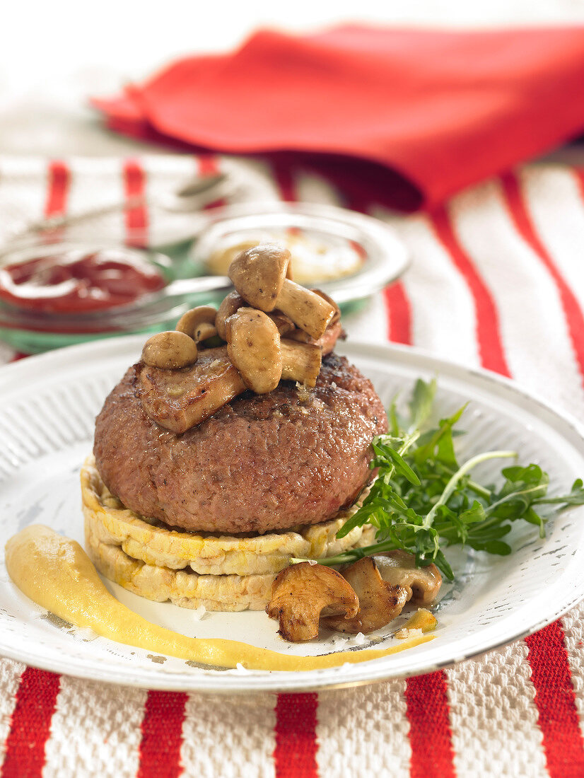 Beef burger with mushrooms and foie gras