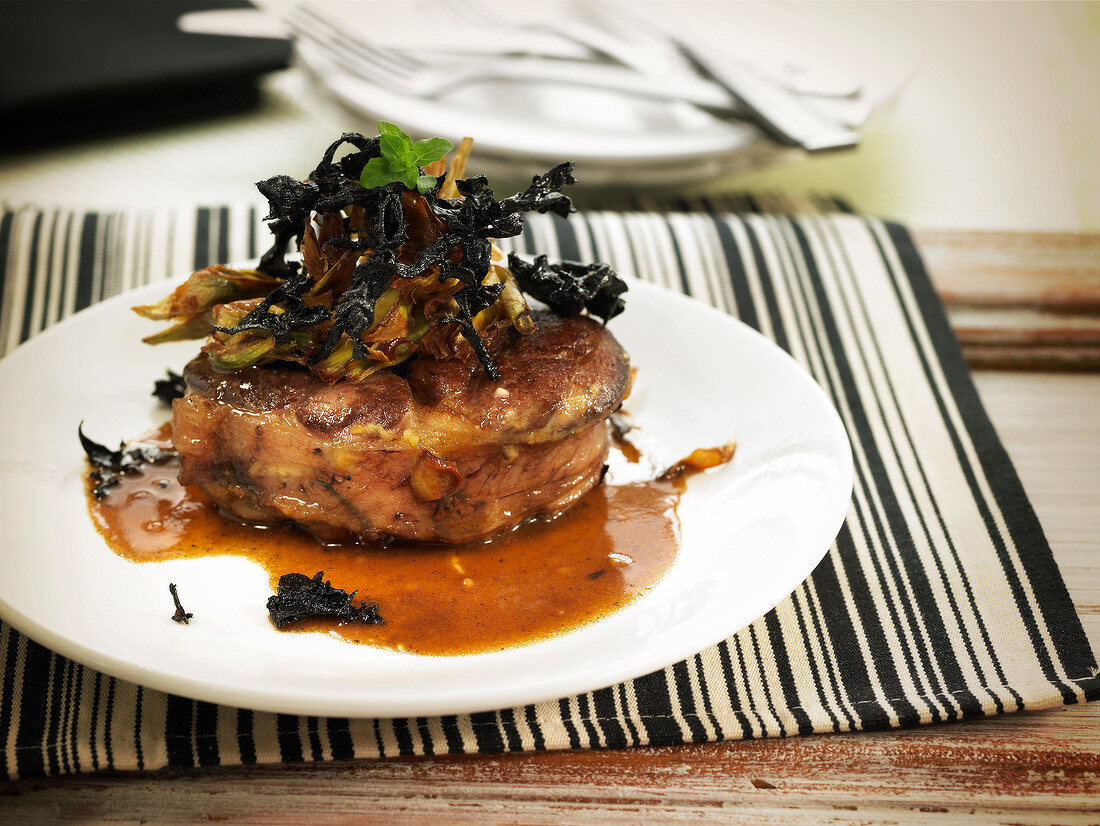 Osso-bucco with artichokes and black trumpet mushrooms