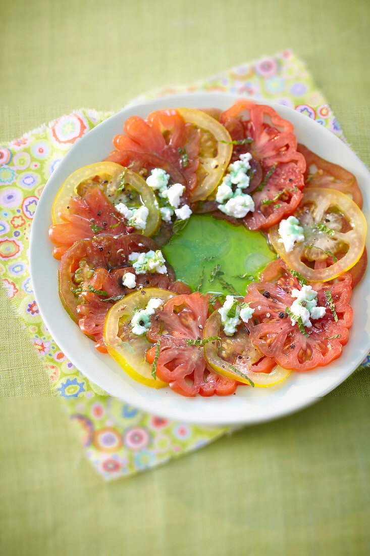 Yellow and red tomato salad, mint syrup