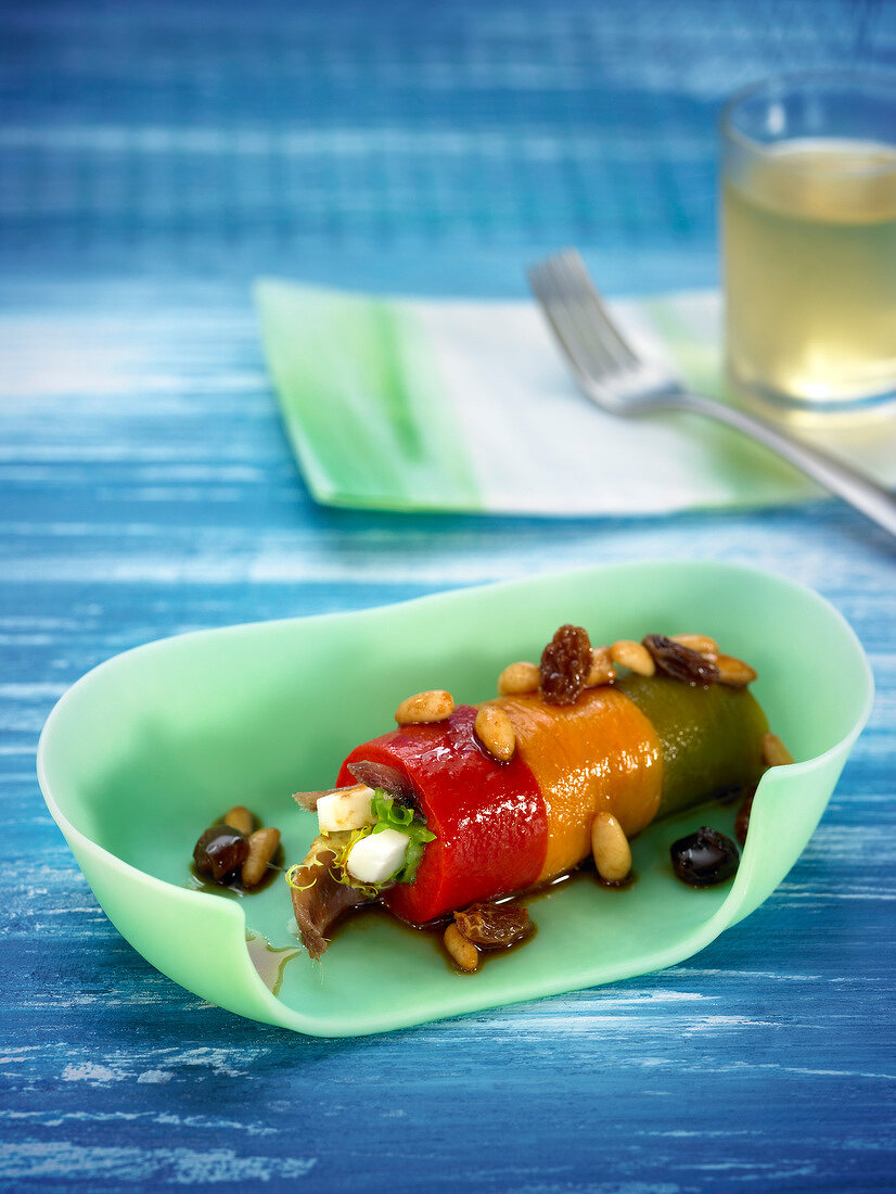 Rolled bell peppers stuffed with dried fruit and cheese