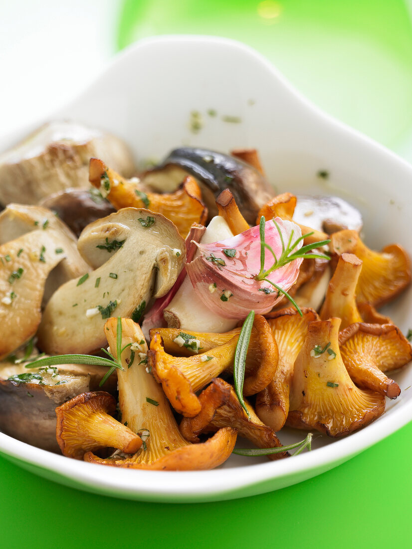 Pan-fried chanterelles and ceps with garlic and tarragon