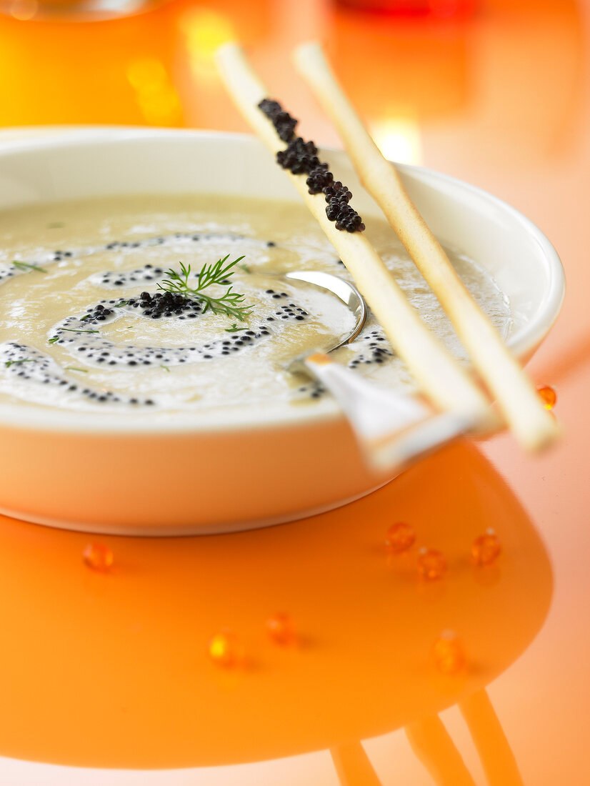 Cream of scallop soup with fish roe