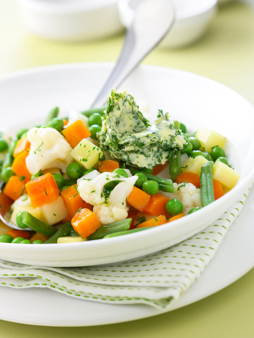 Mixed and diced organic vegetables with parsley