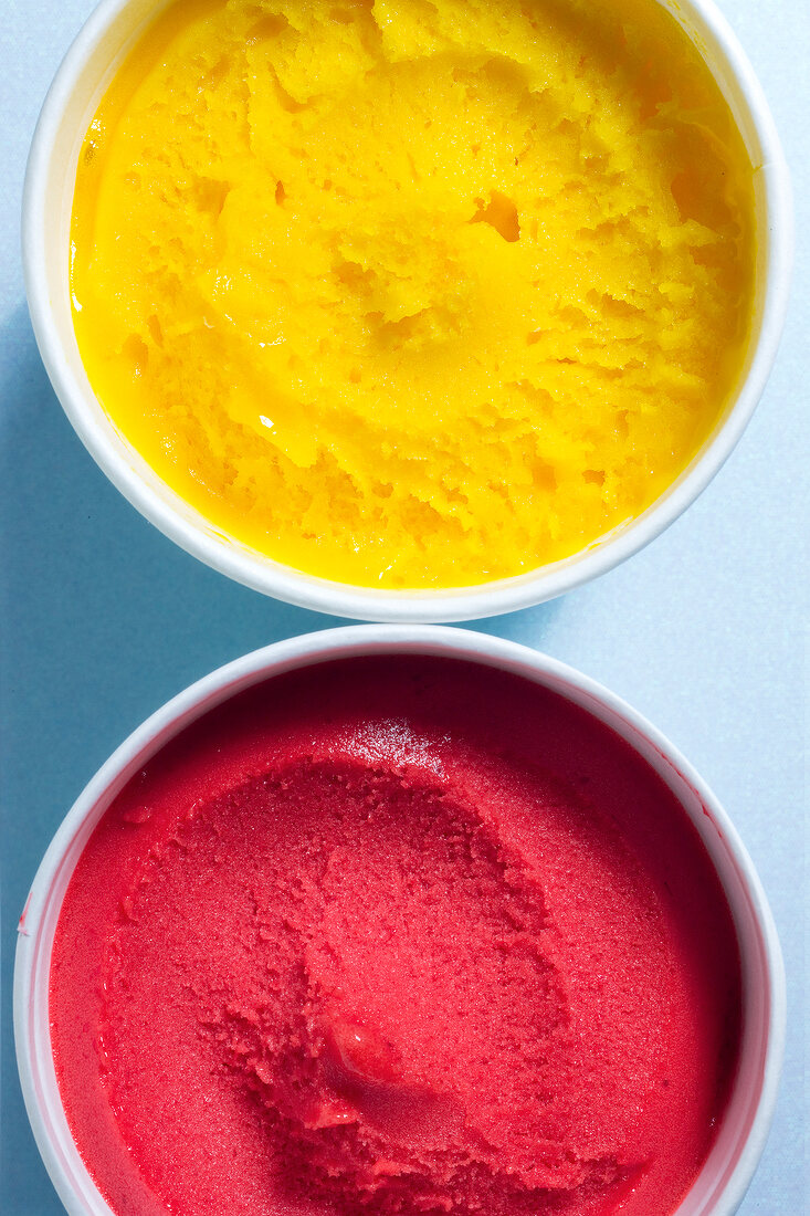 Punnet of raspberry and mango ice cream