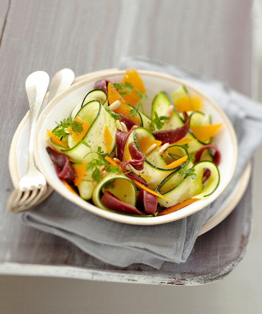Zucchini,mimolette and duck magret salad