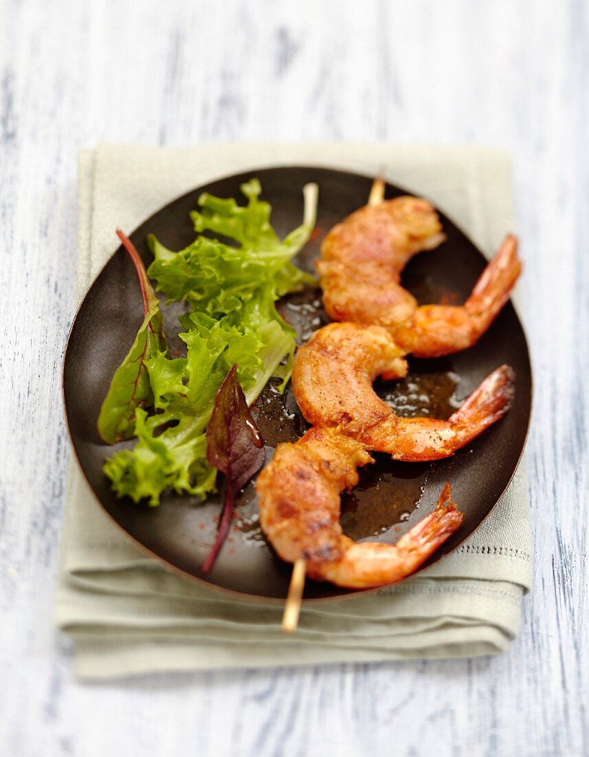 Gambas and bacon brochettes with mild pepper
