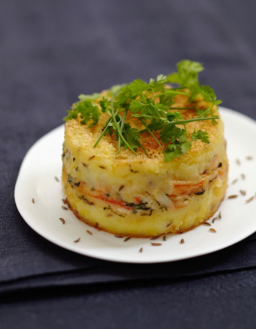 Parmentier (Französischer Schichtauflauf) mit Krabben und Kümmel