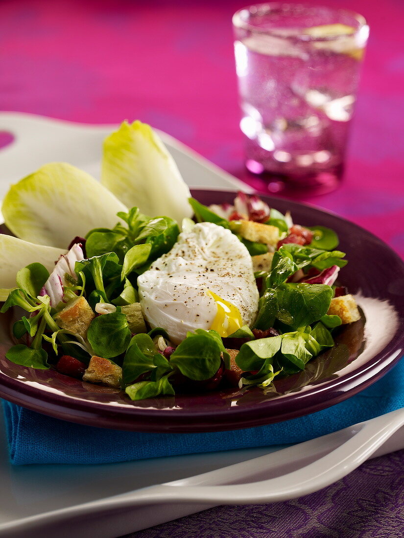 Corn lettuce salad with a soft-boiled egg