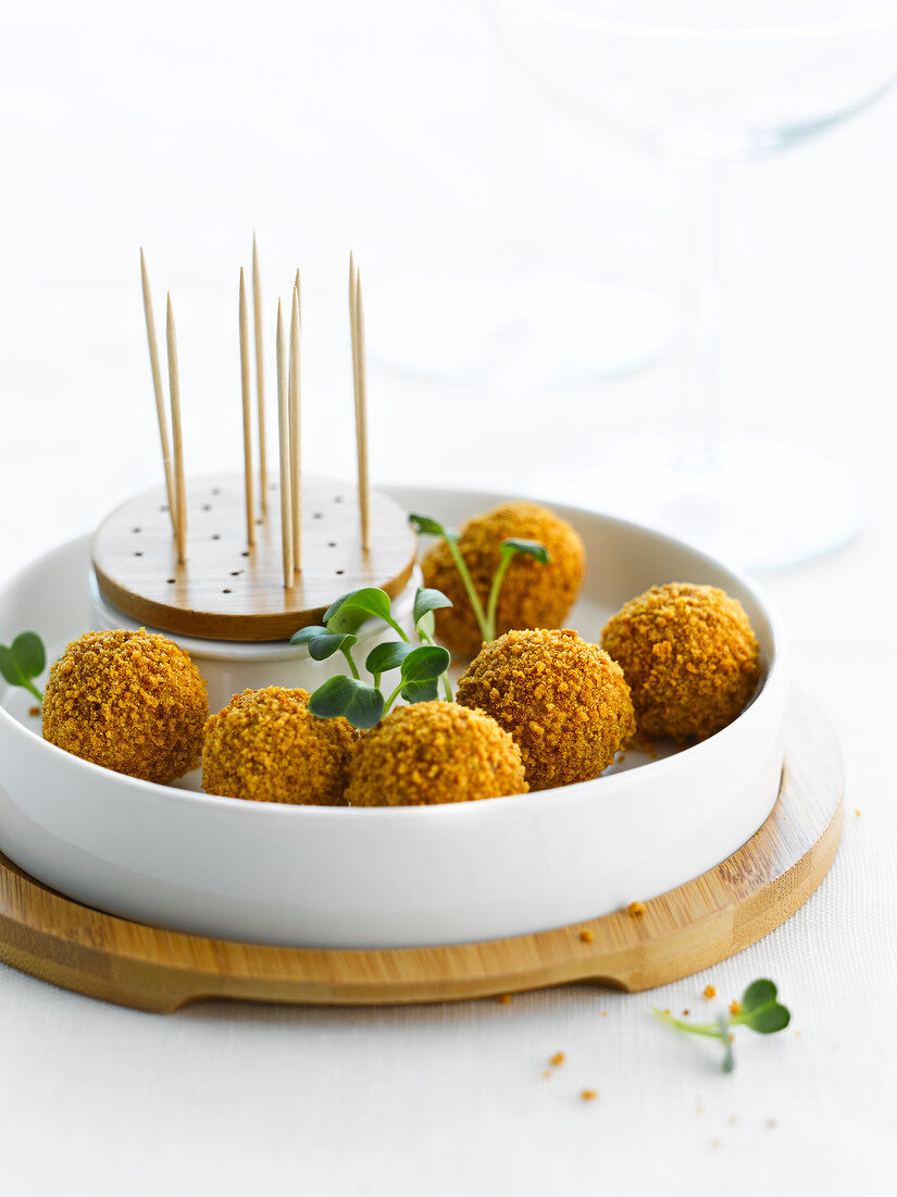 Goose foie gras balls coated in crushed Speculos served with a dip
