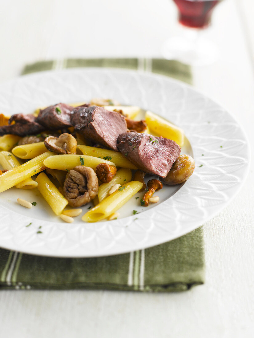 Autumn hare with penne,chestnuts ,chanterelles and mousserons