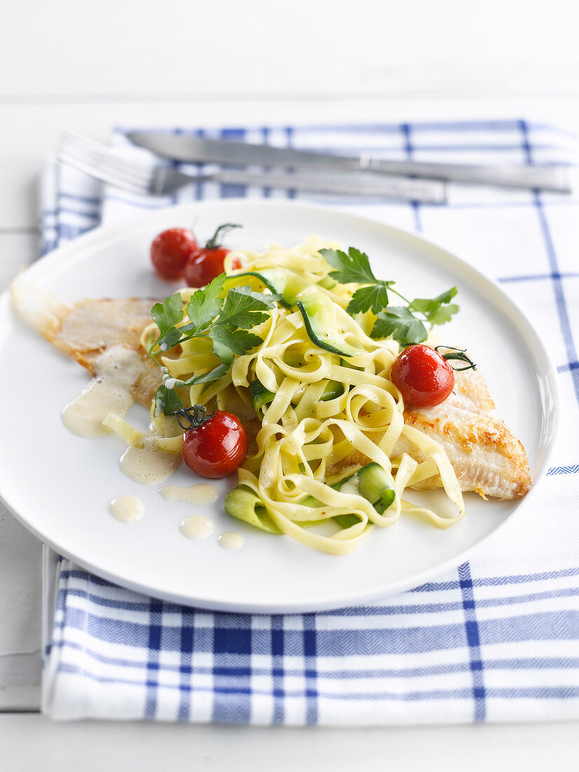 Sole with tagliatelles,cherry tomatoes and zucchinis