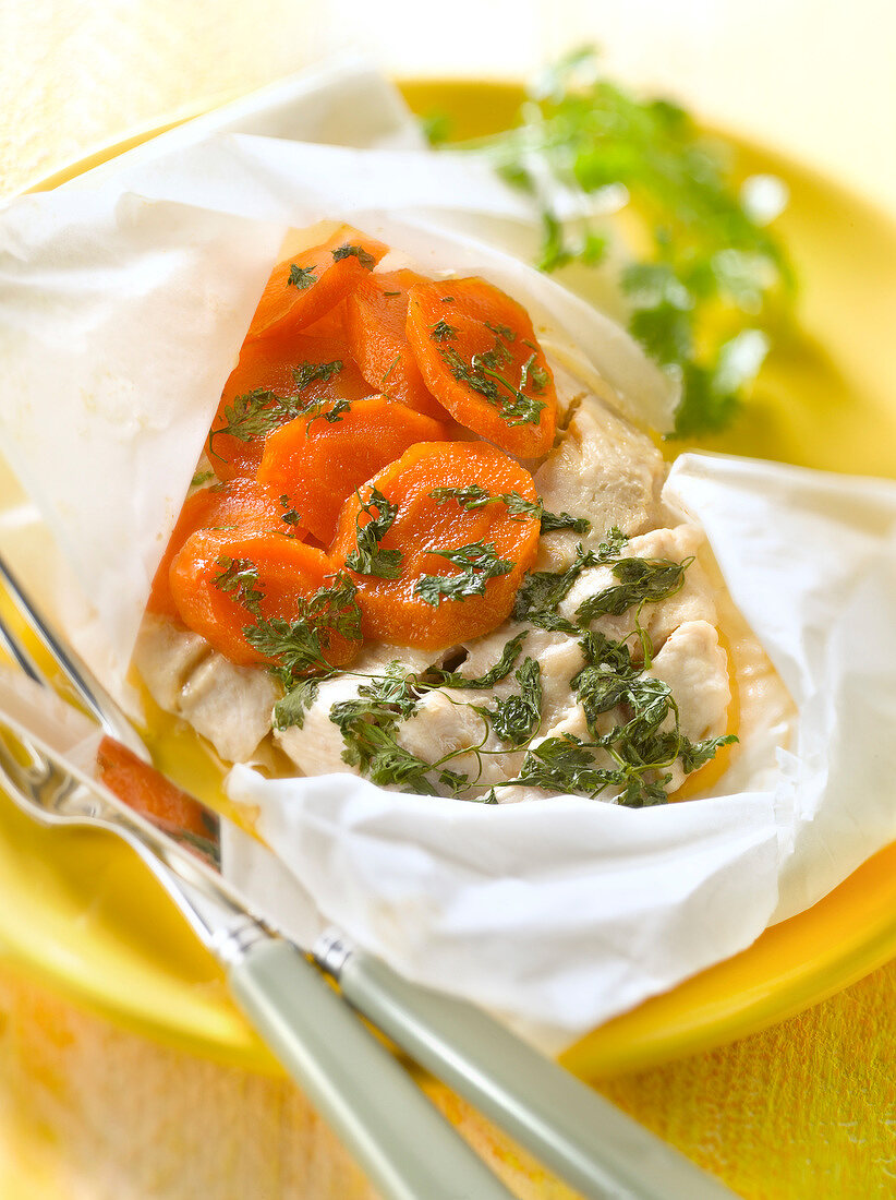 Turkey and carrots with honey and chervil cooked in wax paper
