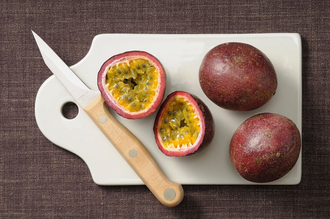 Passion fruits on a chopping board