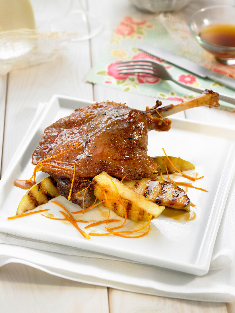 Duck confit with apples and orange zests