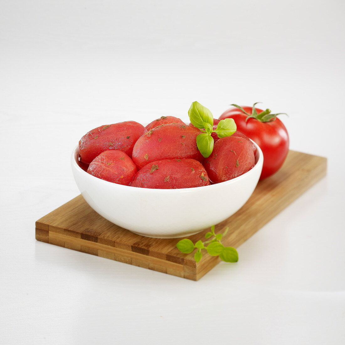 Bowl of whole peeled tomatoes
