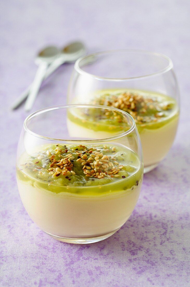 Passion fruit panna cotta with kiwi puree and sesame seeds